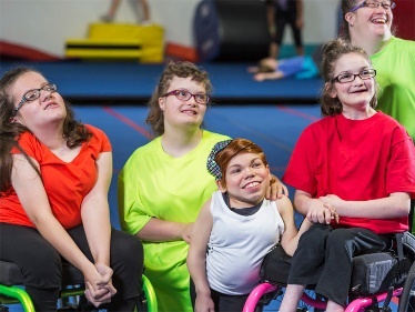 A group of people sitting in wheelchairs

Description automatically generated with low confidence