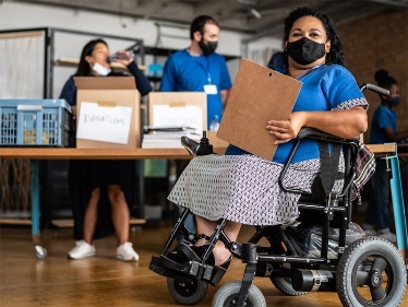 A picture containing text, person, seat

Description automatically generated